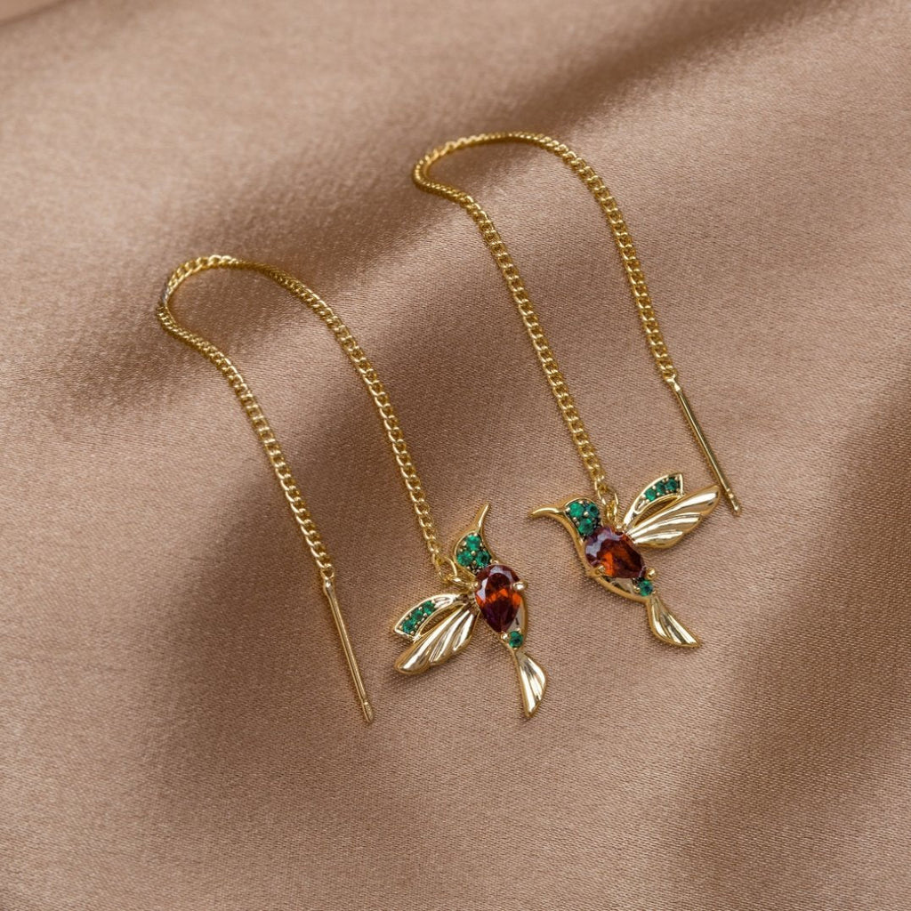 Gold Hummingbird Earrings - Dainty Design for Women, Elegant Everyday Jewelry  

Gold Dainty Hummingbird Earrings for Women - Charming Nature-Inspired Jewelry  

Gold Hummingbird Earrings for Women - Delicate and Whimsical Everyday Style 0