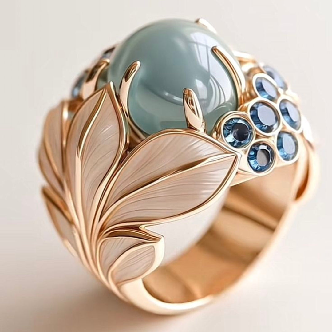 Gold Leaf Ring with Greenish Stone - Elegant Nature-Inspired Jewelry for Women  
Gold Ring for Women - Dainty Leaf Design with Crystal Accent - Perfect Everyday Accessory  
Gold Leaf Ring - Minimalist Nature-Inspired Design for Women - Ideal Gift for Her 0
