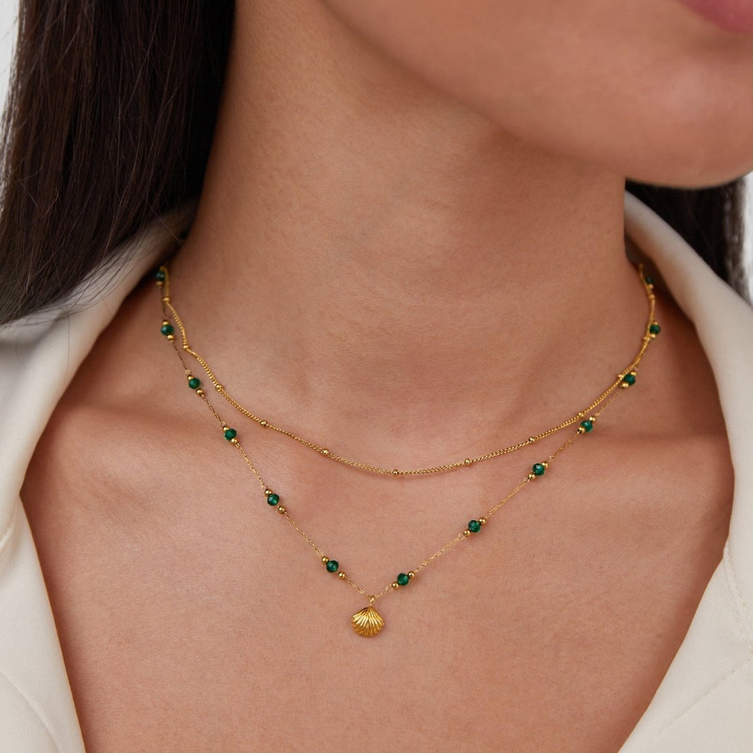 Gold Necklace with Dainty Charm - Elegant Everyday Jewelry for Women  
Gold Dainty Necklace with Charm - Minimalist Accessory for Her  
Gold Charm Necklace - Stylish and Delicate Jewelry Gift for Women 1