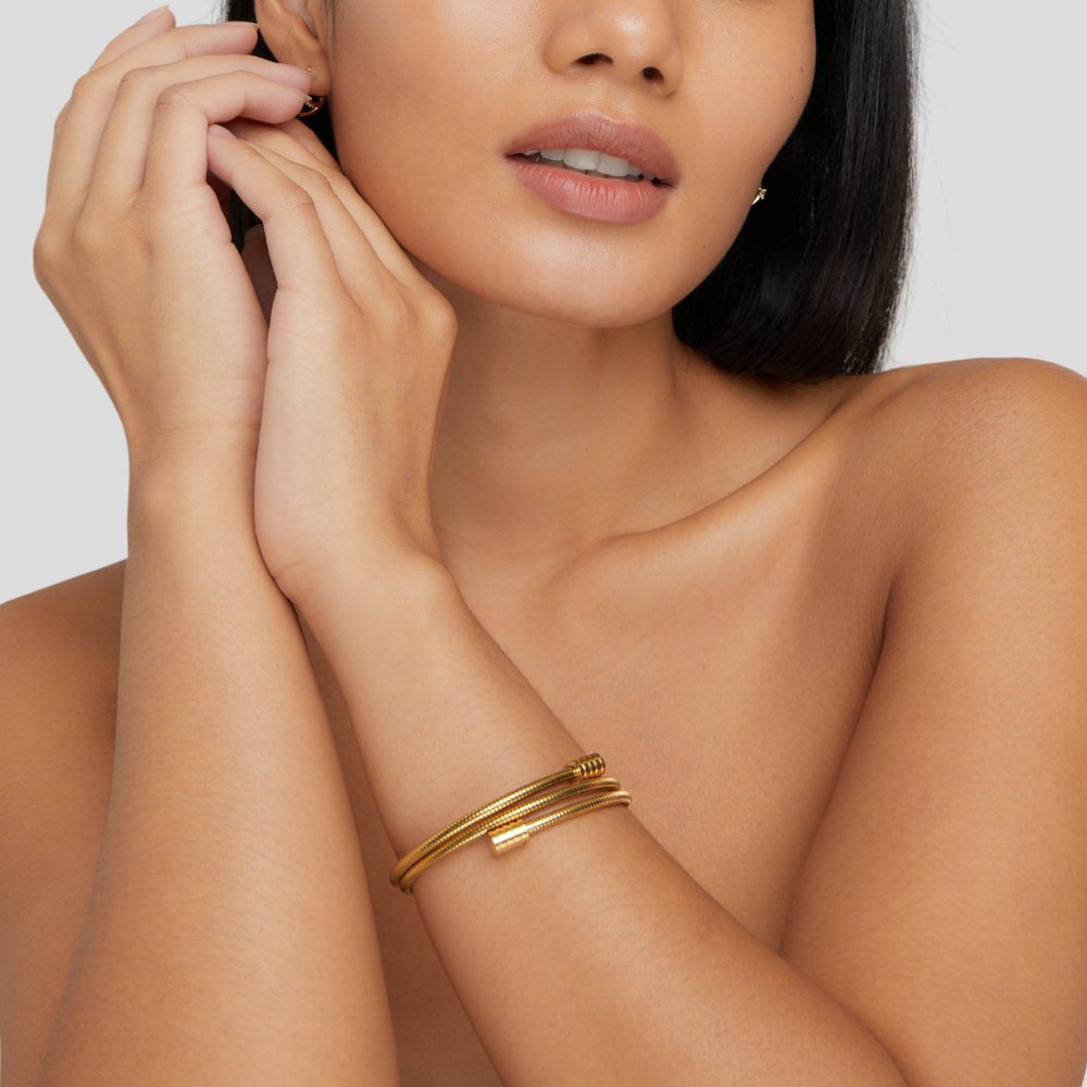 Gold Twisted Bracelet - Dainty Modern Design for Everyday Wear - Perfect Gift for Women  

Gold Twisted Bracelet - Elegant Minimalist Style for Layering - Ideal Gift for Her  

Gold Twisted Bracelet - Stylish Everyday Accessory - Thoughtful Gift for Women 1