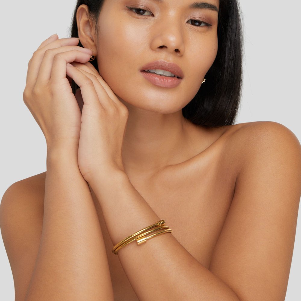 Gold Twisted Bracelet - Dainty Modern Design for Everyday Wear - Perfect Gift for Women  

Gold Twisted Bracelet - Elegant Minimalist Style for Layering - Ideal Gift for Her  

Gold Twisted Bracelet - Stylish Everyday Accessory - Thoughtful Gift for Women 4